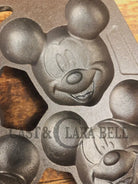 So cool! Lodge made Mickey Mouse Gem Pan. Makes great mini cakes! - Bakeware