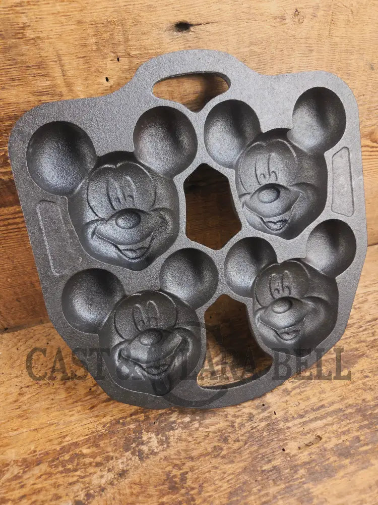 So cool! Lodge made Mickey Mouse Gem Pan. Makes great mini cakes! - Bakeware