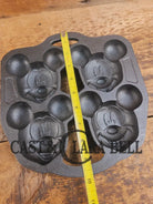 So cool! Lodge made Mickey Mouse Gem Pan. Makes great mini cakes! - Bakeware