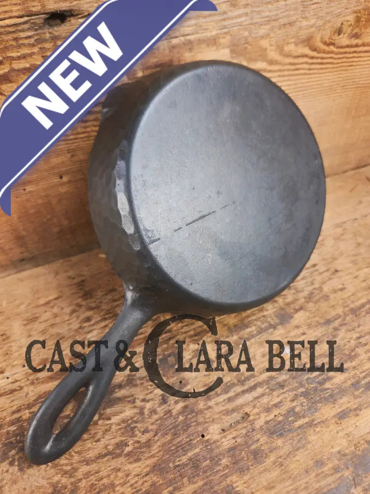 So cool! The hammered Unknown Foundry pointy handle #3 cast iron skillet. Maker Unknown great for sides! Skillet