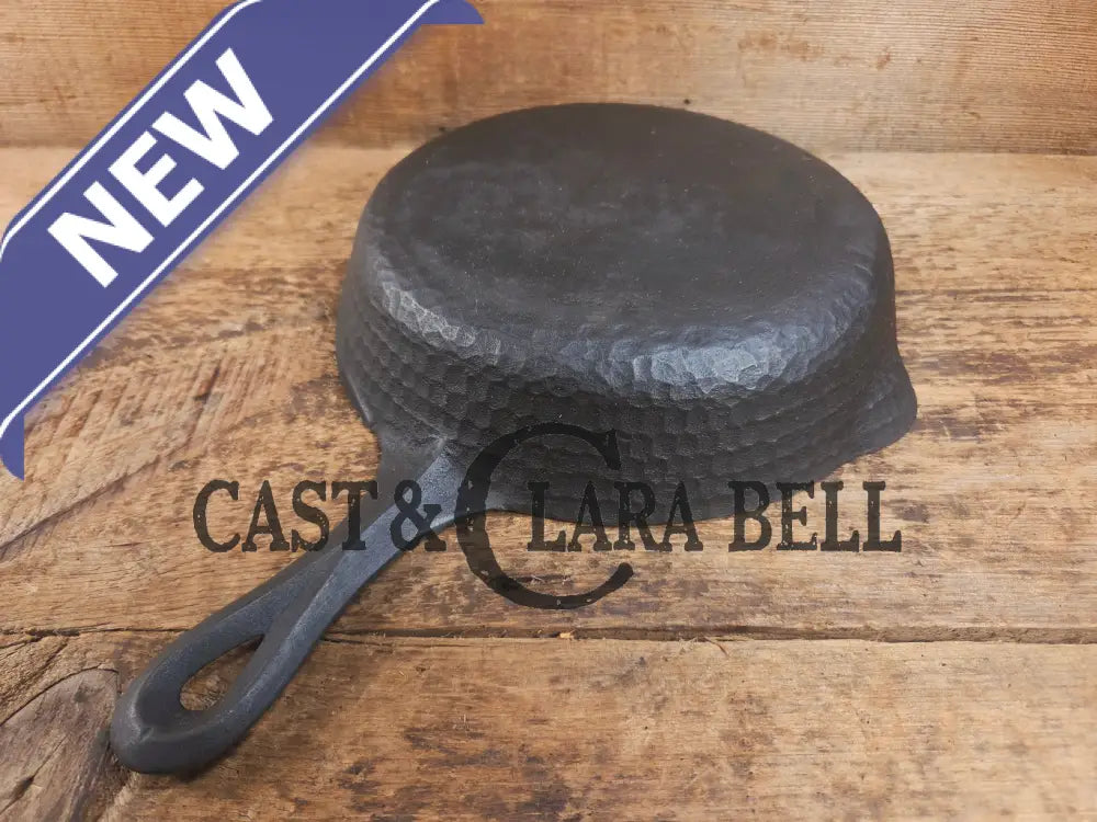 So cool! The hammered Unknown Foundry pointy handle #5 cast iron skillet. Maker Unknown great for sides! Skillet