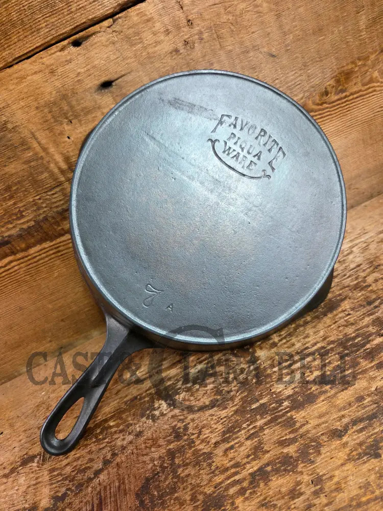 So unique! 1930’s Favorite Piqua Ware #7 Cast Iron Skillet Smiley Logo and Ghostmark CHF logo Skillet