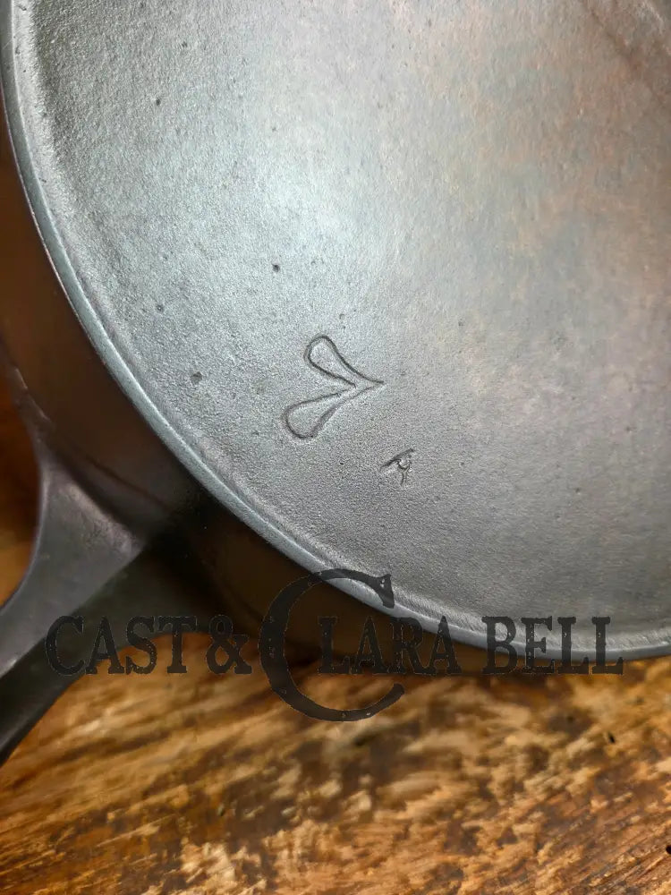So unique! 1930’s Favorite Piqua Ware #7 Cast Iron Skillet Smiley Logo and Ghostmark CHF logo Skillet