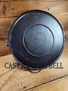 Spectacular piece! 1910’s #742 Griswold No. 14 Round Griddle w/ Bail and Slant Logo. The largest made of its kind and