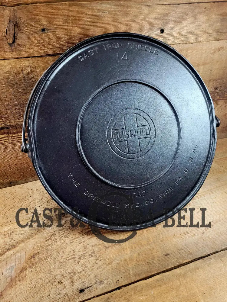 Spectacular piece! 1910’s #742 Griswold No. 14 Round Griddle w/ Bail and Slant Logo. The largest made of its kind and