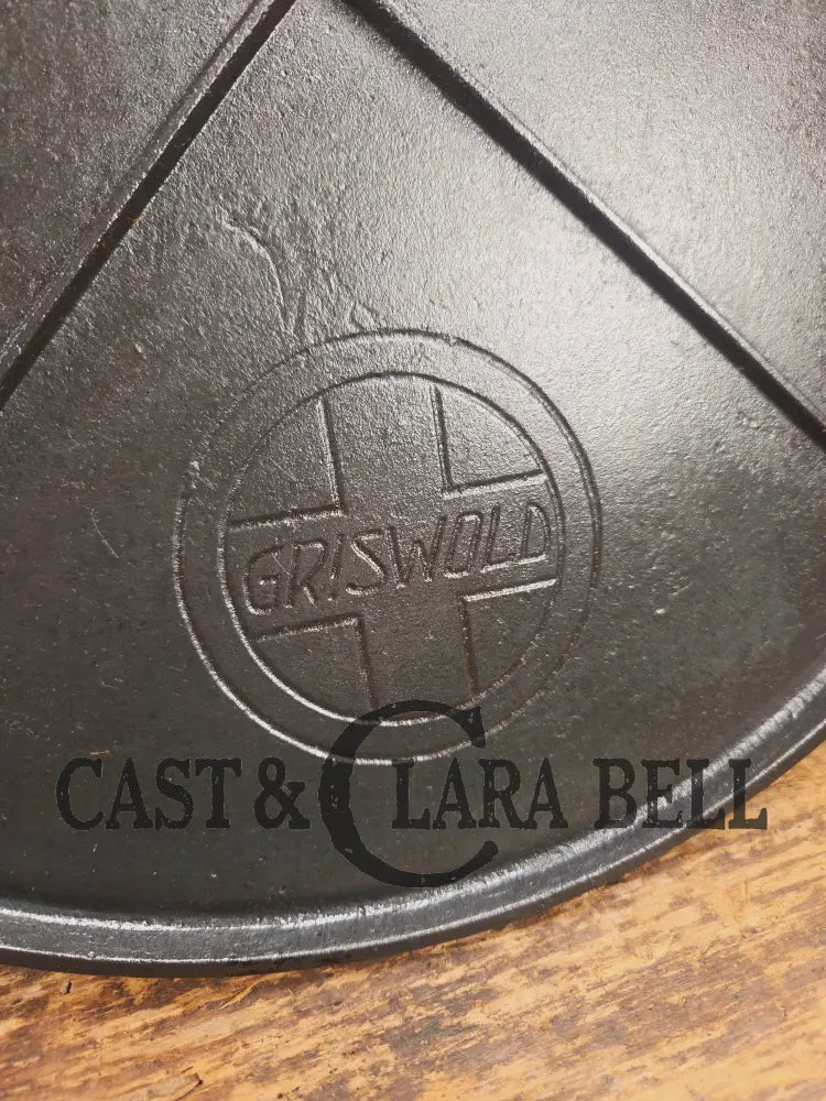 Spectacular piece! 1910’s #742 Griswold No. 14 Round Griddle w/ Bail and Slant Logo. The largest made of its kind and