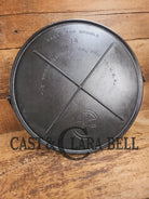 Spectacular piece! 1910’s #742 Griswold No. 14 Round Griddle w/ Bail and Slant Logo. The largest made of its kind and
