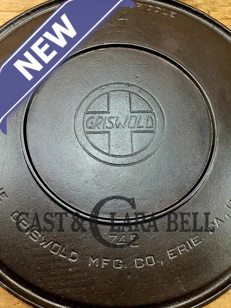 Spectacular piece! 1910’s #742 Griswold No. 14 Round Griddle w/ Bail and Slant Logo. The largest made of its kind and