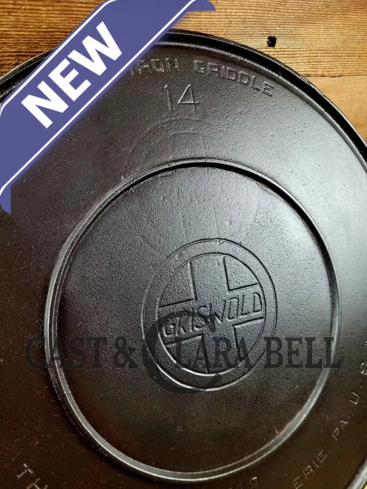 Spectacular piece! 1910’s #742 Griswold No. 14 Round Griddle w/ Bail and Slant Logo. The largest made of its kind and