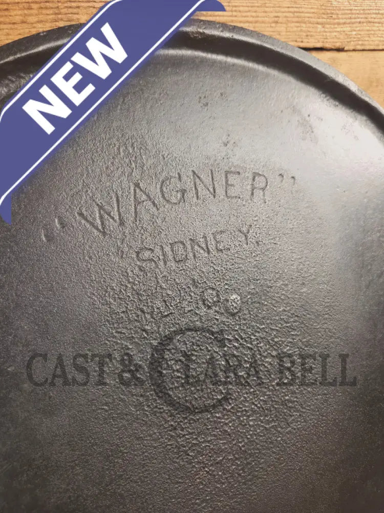 Spectacular piece! EARLY 1900’s Wagner arc straight logo #14 bailed round griddle SC24 - Griddle