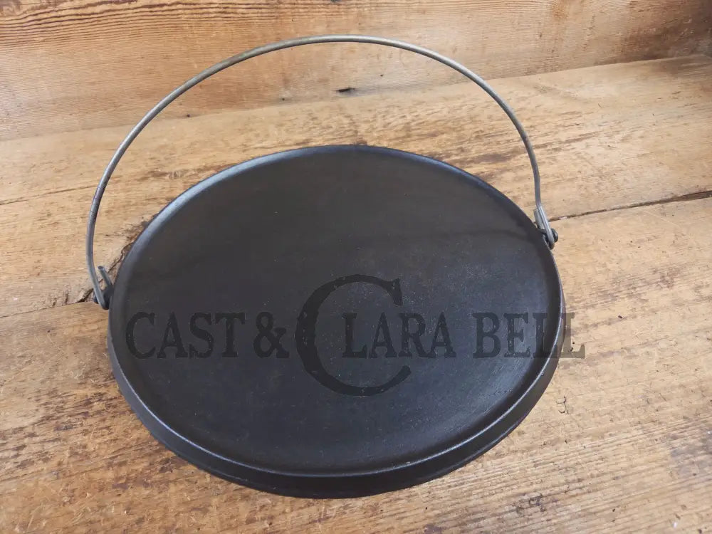 Spectacular piece! EARLY 1900’s Wagner arc straight logo #14 bailed round griddle SC24 - Griddle