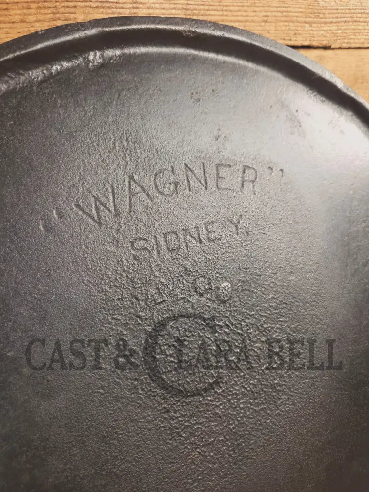 Spectacular piece! EARLY 1900’s Wagner arc straight logo #14 bailed round griddle SC24 - Griddle
