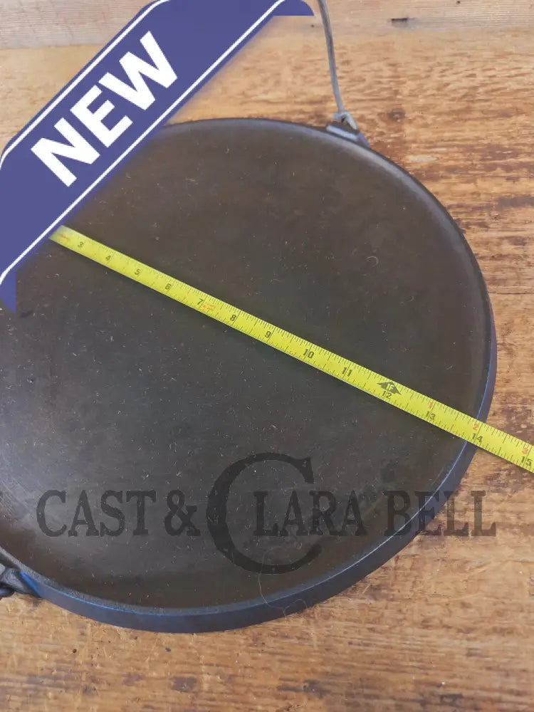 Spectacular piece! Late 1910’s #742 Griswold No. 14 Round Griddle w/ Bail and Slant Logo. The largest made of its kind