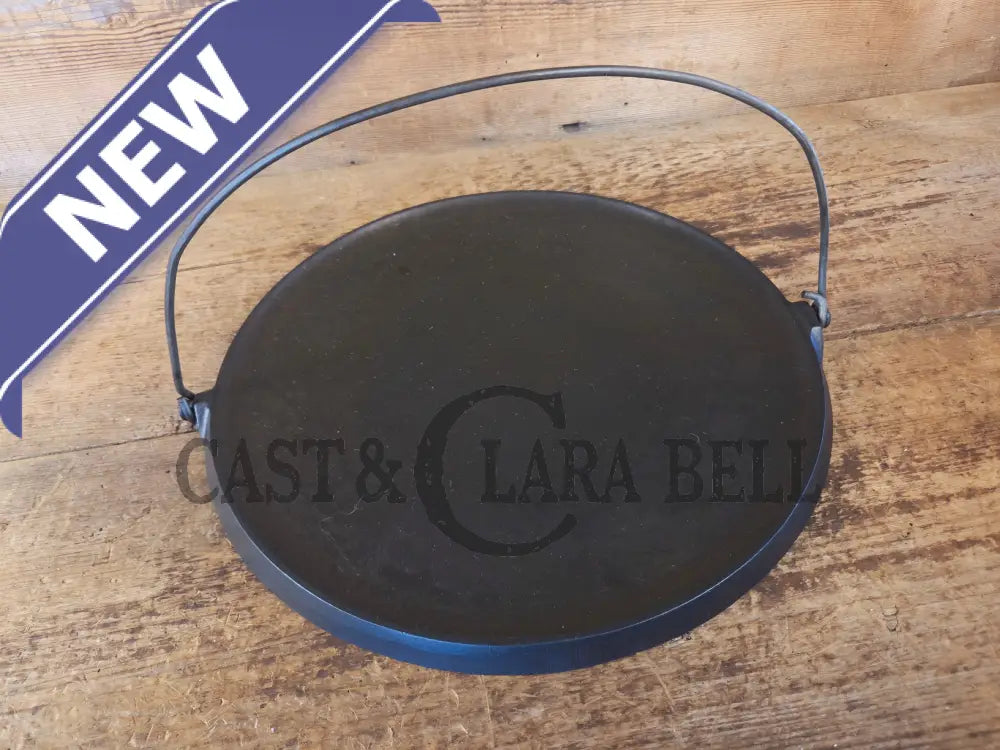 Spectacular piece! Late 1910’s #742 Griswold No. 14 Round Griddle w/ Bail and Slant Logo. The largest made of its kind