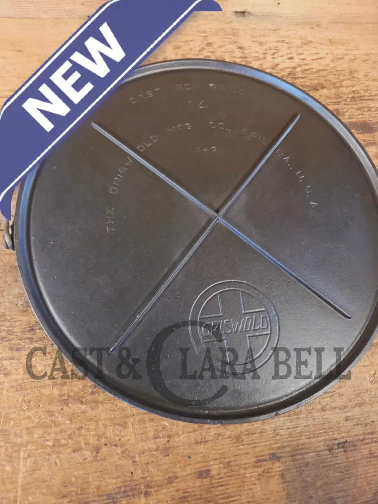 Spectacular piece! Late 1910’s #742 Griswold No. 14 Round Griddle w/ Bail and Slant Logo. The largest made of its kind