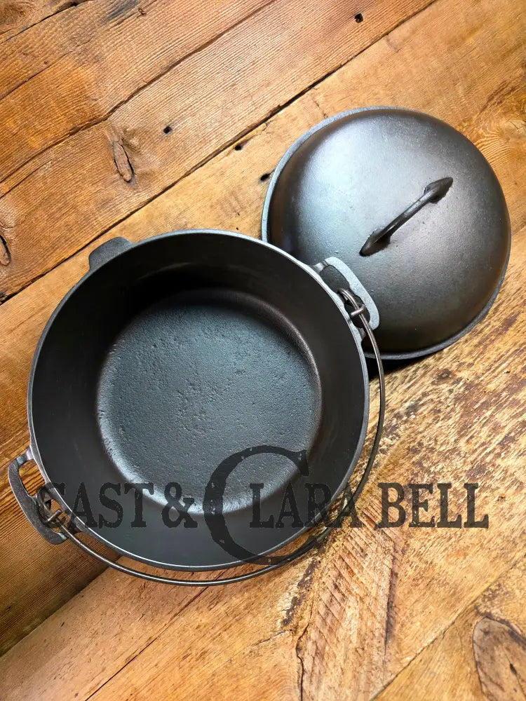 Stunning! 1930’s Favorite Piqua Ware #8 Dutch Oven with matching lid. Smiley Logo. Dutch Ovens Trivets & Kettles