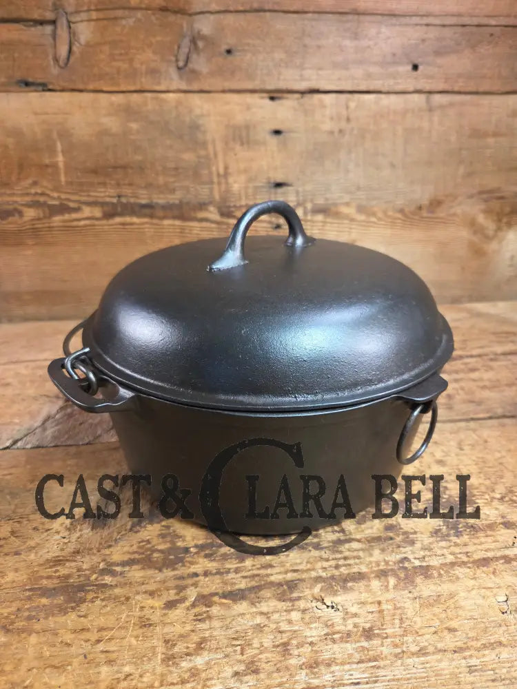 Stunning! 1930’s Favorite Piqua Ware #8 Dutch Oven with matching lid. Smiley Logo. Dutch Ovens Trivets & Kettles