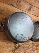 Stunning! 1930’s Favorite Piqua Ware #8 Dutch Oven with matching lid. Smiley Logo. Dutch Ovens Trivets & Kettles