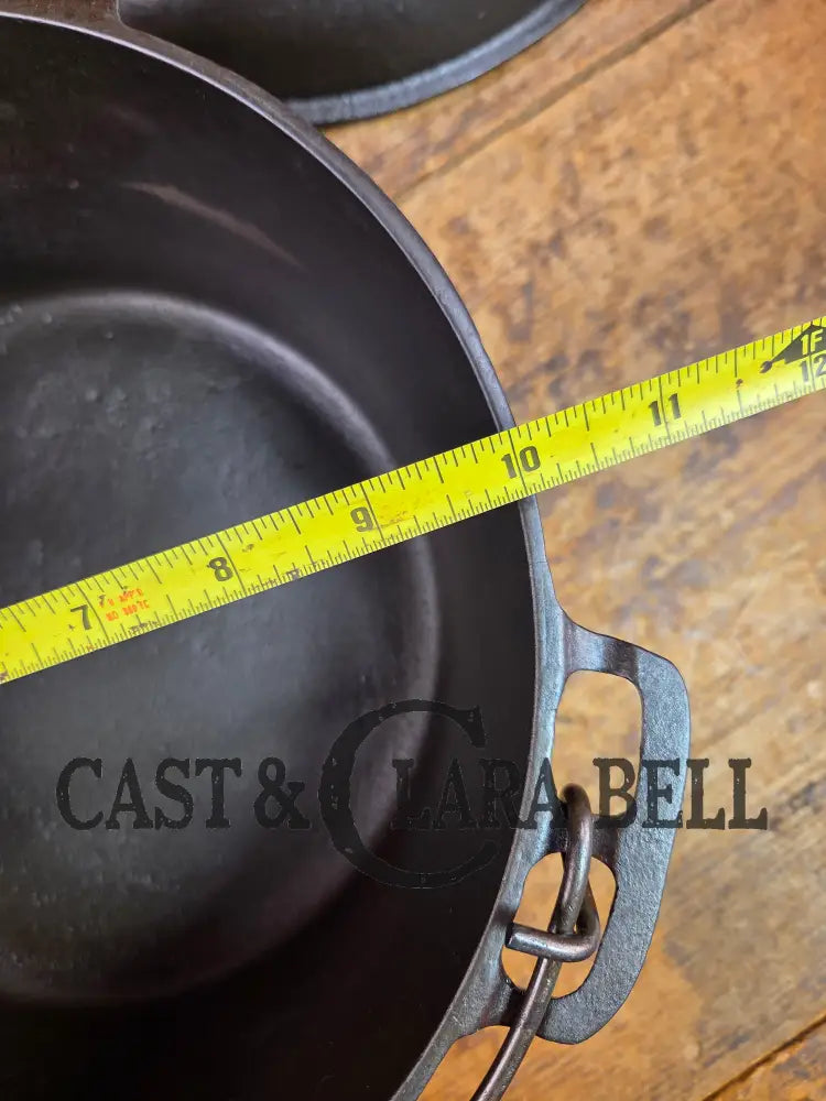 Stunning! 1930’s Favorite Piqua Ware #8 Dutch Oven with matching lid. Smiley Logo. Dutch Ovens Trivets & Kettles