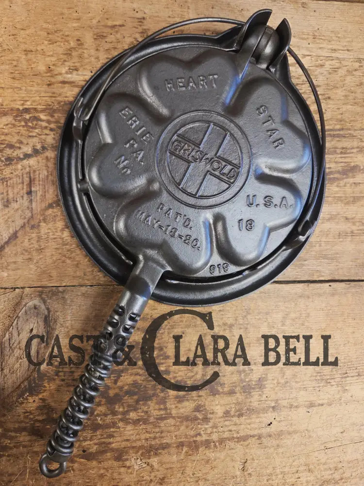 Stunning. The Premier waffle iron! Griswold No. 18 ’Heart and Star’ (919/920) Waffle Iron. Bailed Low Base. Makes the