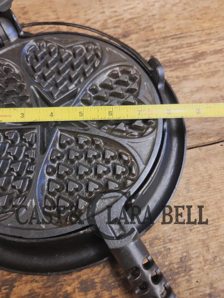 Stunning. The Premier waffle iron! Griswold No. 18 ’Heart and Star’ (919/920) Waffle Iron. Bailed Low Base. Makes the