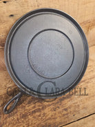 Super unique and gorgeous!! #740 Griswold #10 Round handled griddle with SLANT logo and NO Circles! Very different