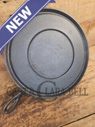 Super unique and gorgeous!! #740 Griswold #10 Round handled griddle with SLANT logo and NO Circles! Very different