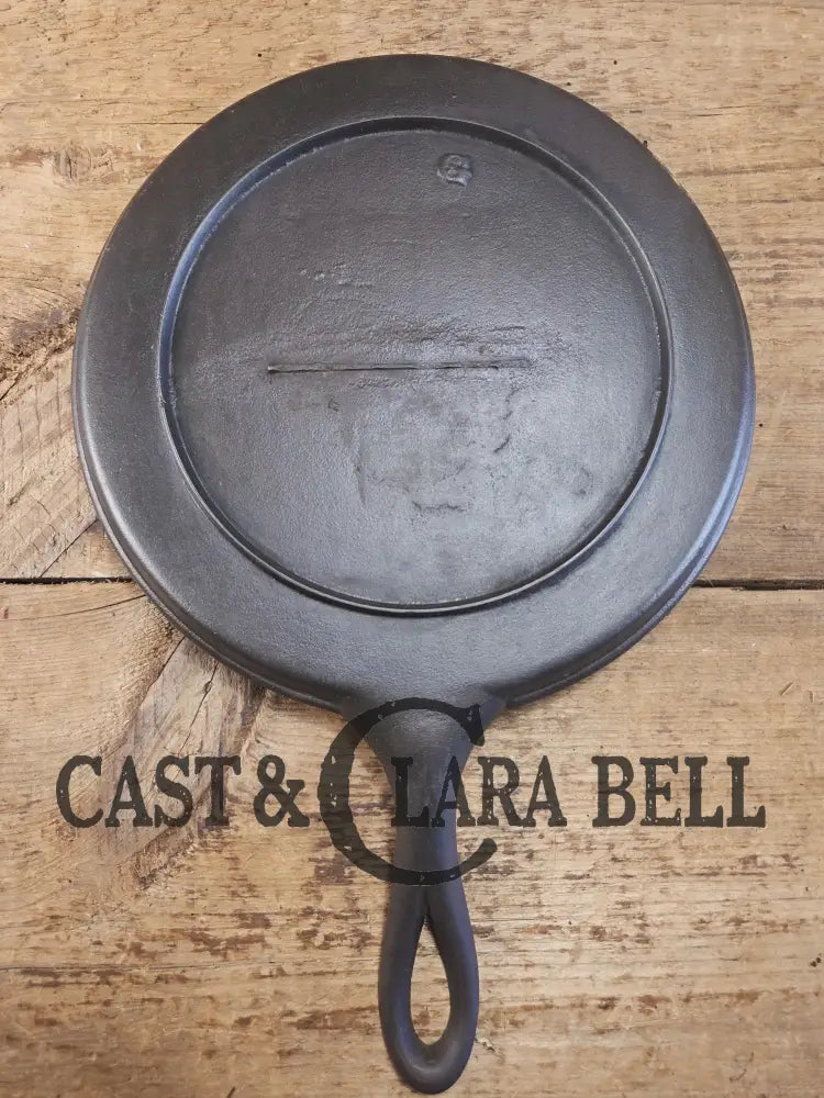 Super unique! Late 1800’s antique Gate marked Round Cast Iron Stove Eye Griddle. Elegant & hard working. Cool raised