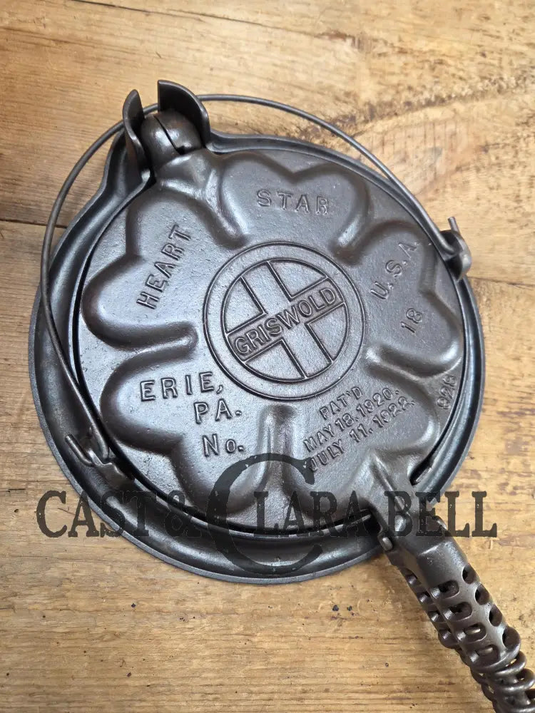 The Premier waffle iron! Griswold No. 18 ’Heart and Star’ (928/928) Waffle Iron (Large Star version). Bailed base.