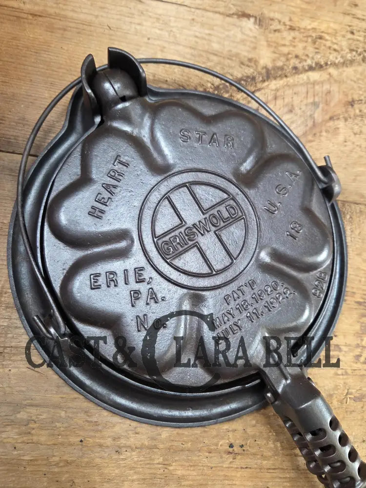 The Premier waffle iron! Griswold No. 18 ’Heart and Star’ (928/928) Waffle Iron (Large Star version). Bailed base.