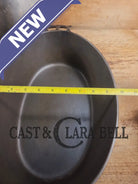 Turtle Top Style Wagner #5 Oval Roaster with Sawtooth drip lid and Stylized logo bottom Dutch Ovens Trivets & Kettles