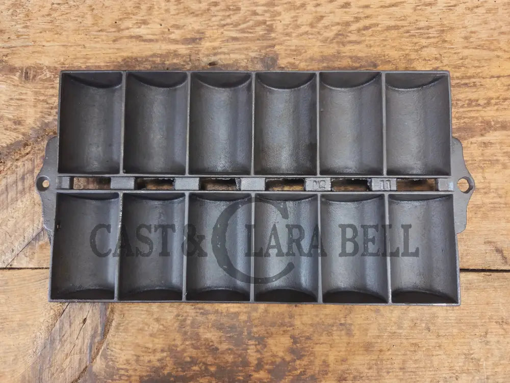 Unknown French Roll No. 11 Pan raised No. 11 & French Roll markings. Very similar to Griswold but likely Unknown