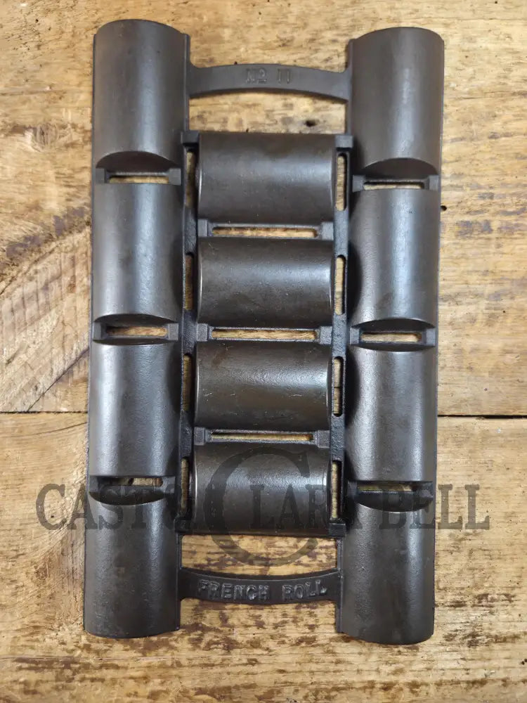 Unknown French Roll No. 11 Pan w/ raised No. 11 & French Roll markings. Rumored Griswold but likely Unknown Beautiful