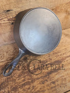 Unmarked #5 Saute Skillet with Heat Ring. An Awesome sauce pan! Looks very similar to Wagner - Skillet