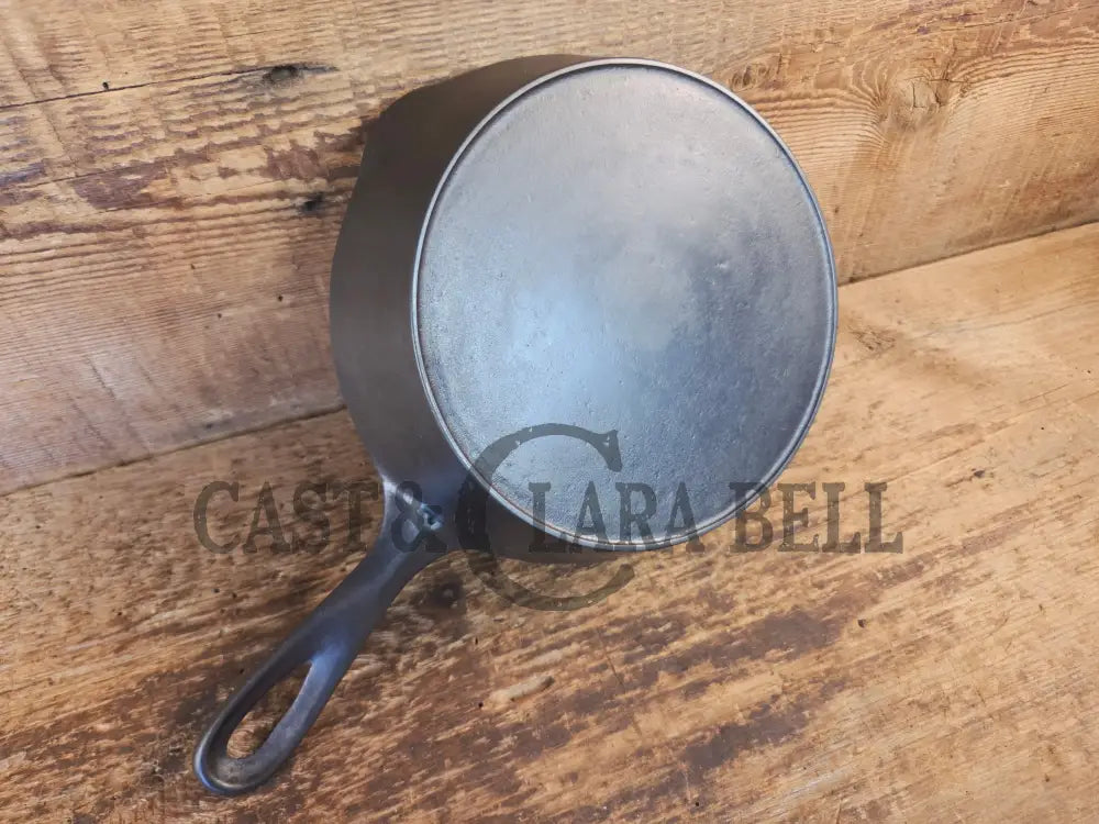Unmarked #5 Saute Skillet with Heat Ring. An Awesome sauce pan! Looks very similar to Wagner - Skillet