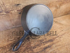 Unmarked #5 Saute Skillet with Heat Ring. An Awesome sauce pan! Looks very similar to Wagner - Skillet