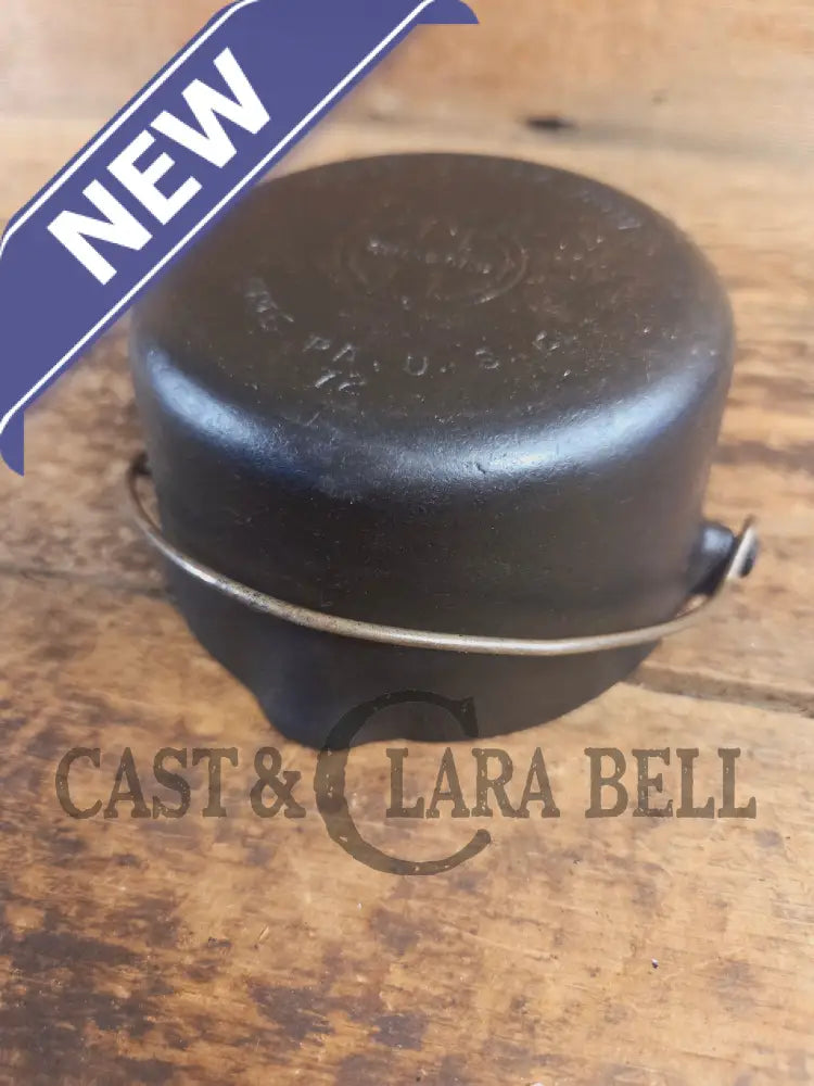 Very cool mini cast piece. 1940’s Griswold Cast Iron Patty Bowl with bailed handle. Great utility piece! - Dutch Ovens