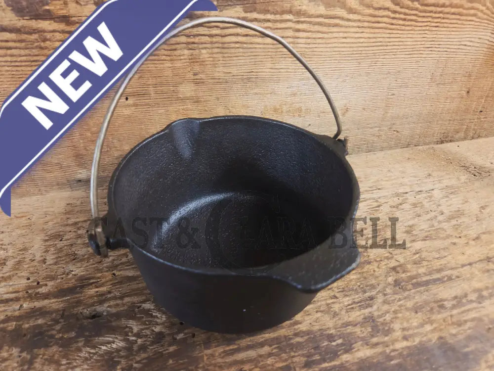Very cool mini cast piece. 1940’s Griswold Cast Iron Patty Bowl with bailed handle. Great utility piece! - Dutch Ovens