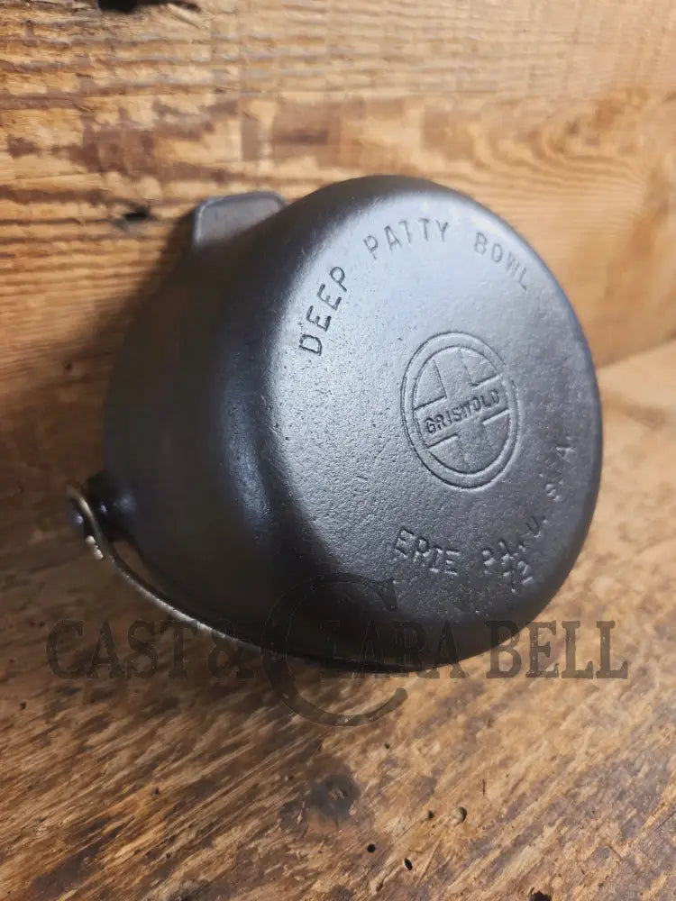 Very cool mini cast piece. 1940’s Griswold Cast Iron Patty Bowl with bailed handle. Great utility piece! - Dutch Ovens