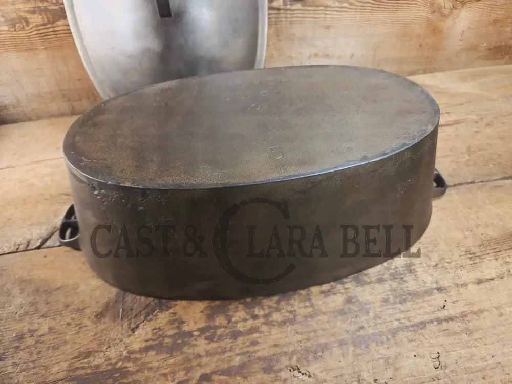 Very early Wagner #5 Nickle finish oval roaster. Beautiful patina on the outside and near perfect inside. Great bread