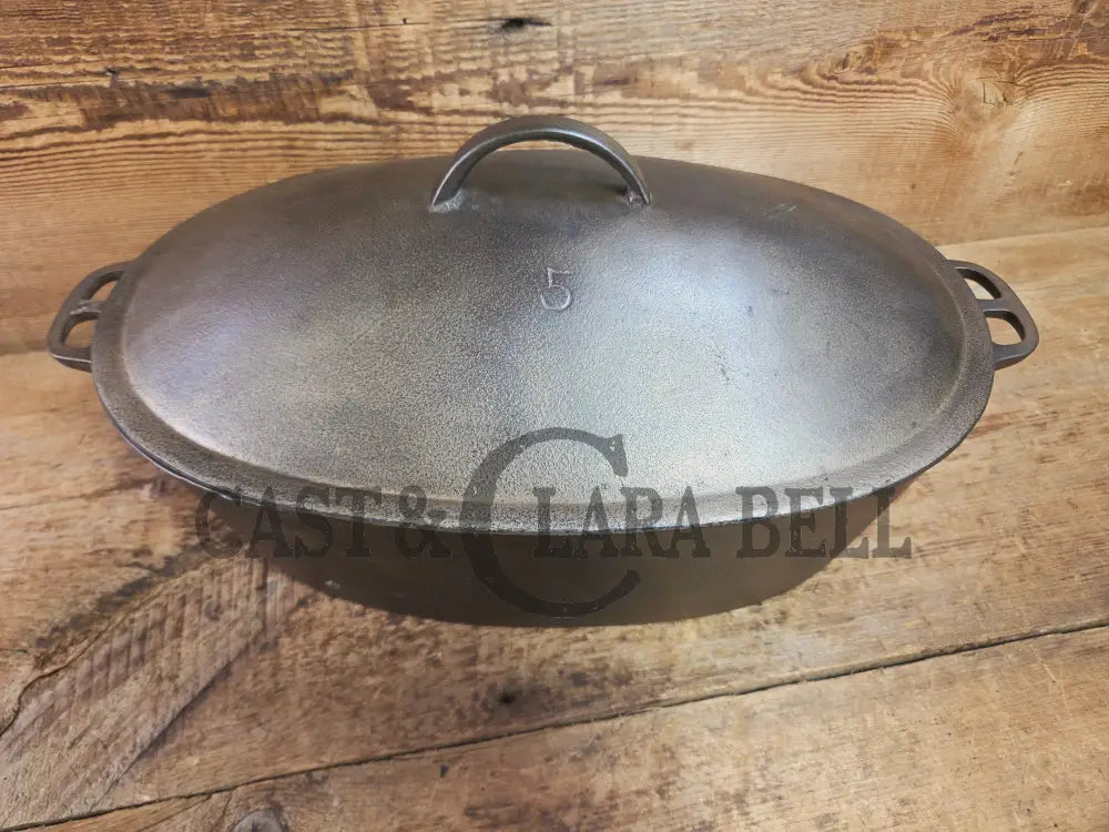 Very early Wagner #5 Nickle finish oval roaster. Beautiful patina on the outside and near perfect inside. Great bread