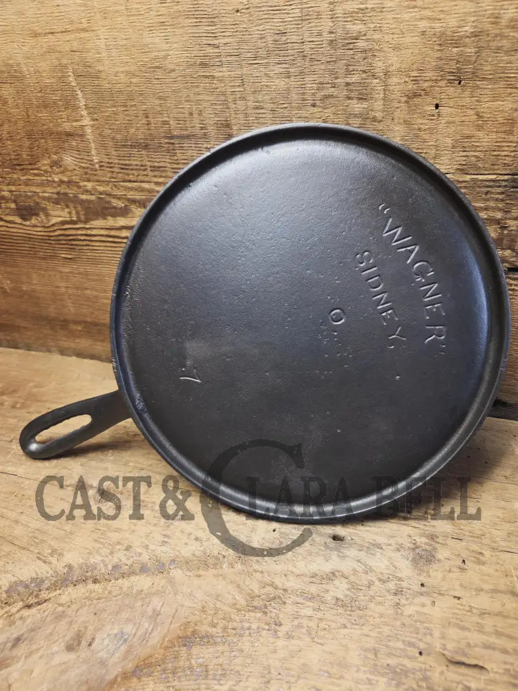 Very Hard to Find. Early 1900’s Wagner ’Arc’ Straight Logo #7 Griddle Skillet. Over 120 years old and in almost perfect