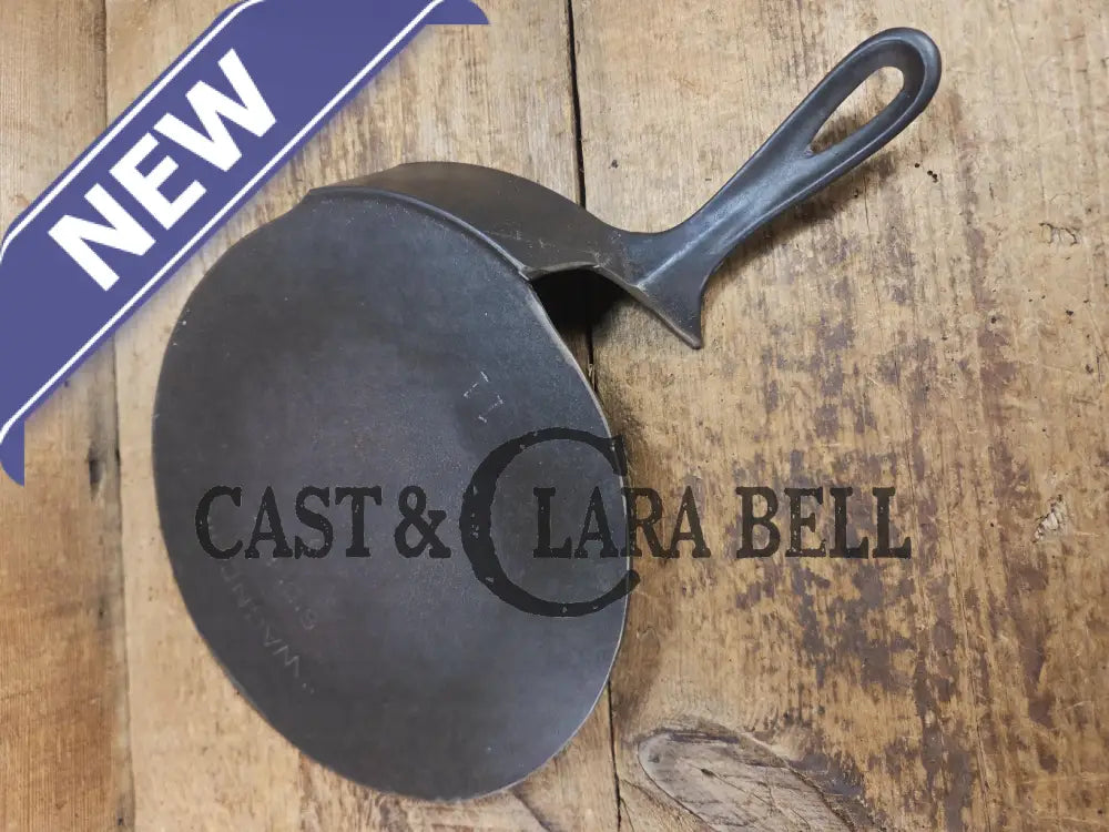 What a funky creation! Huge Repurposed Wagner #11 cast iron spatula. Possible pizza peel for your homemade pizzas!