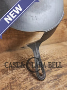 What a funky creation! Huge Repurposed Wagner #11 cast iron spatula. Possible pizza peel for your homemade pizzas!