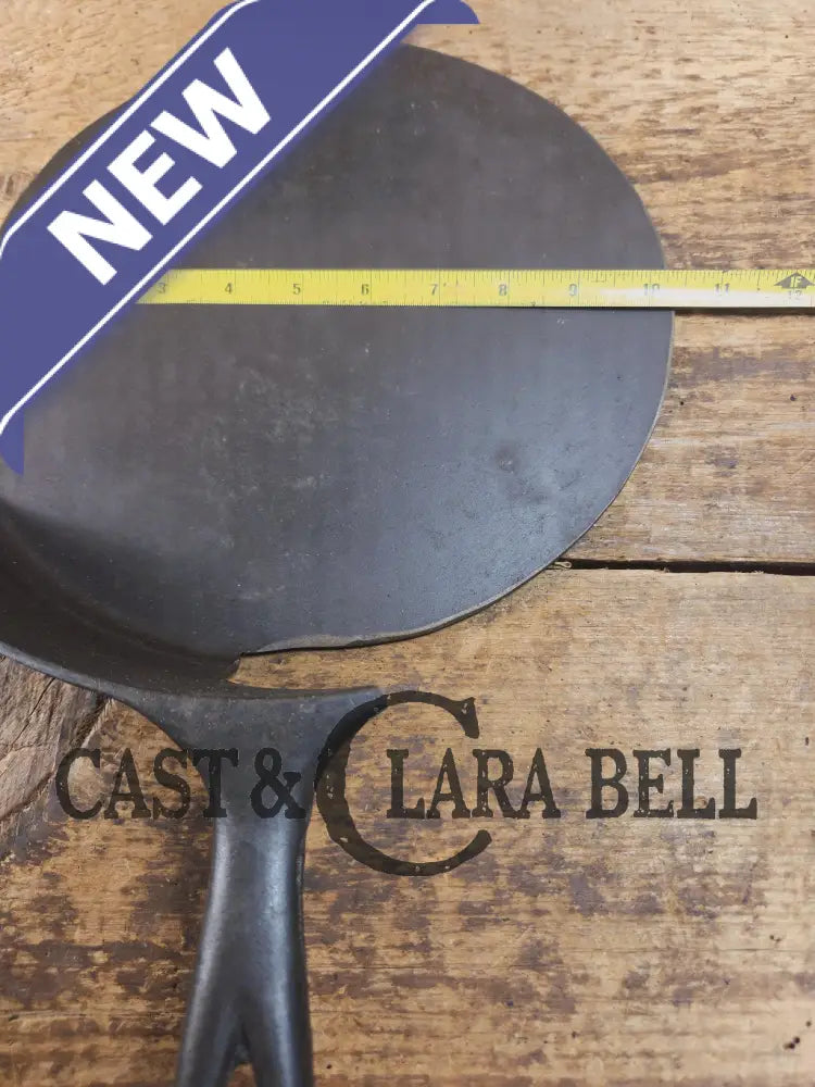 What a funky creation! Huge Repurposed Wagner #11 cast iron spatula. Possible pizza peel for your homemade pizzas!