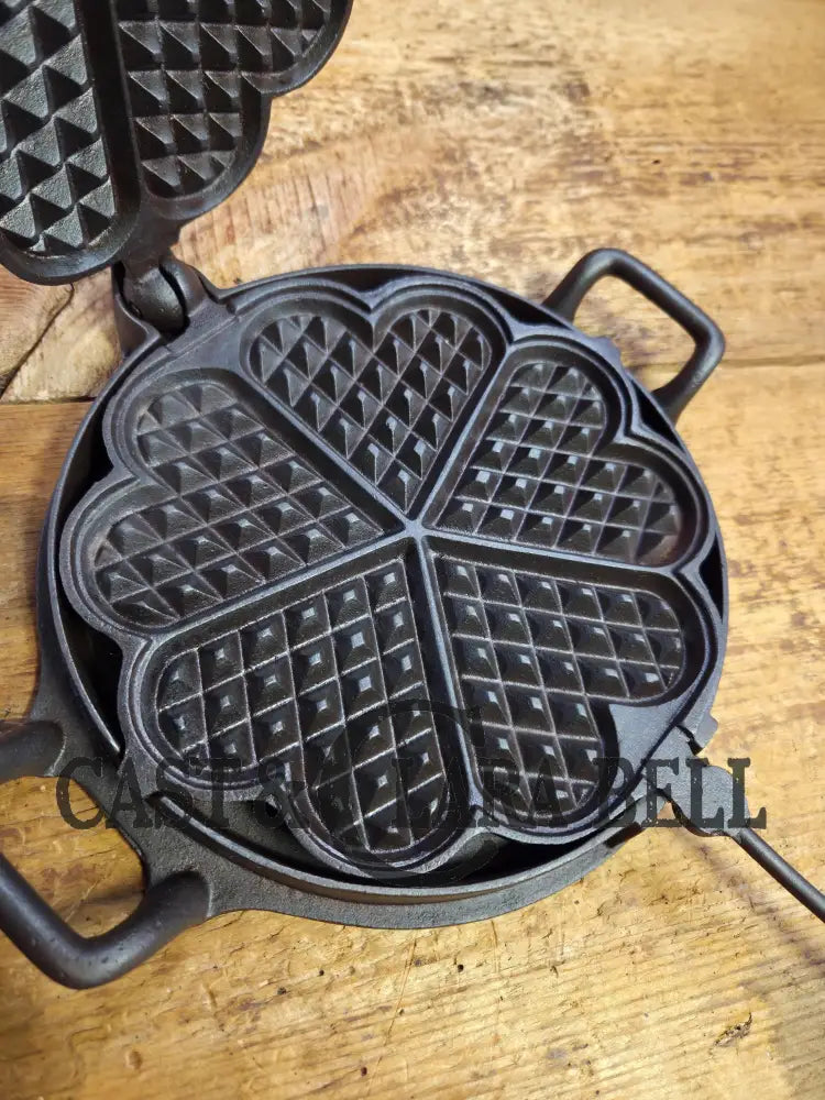 What a gift! Unique for cast iron or waffle enthusiasts! Voss Cast heart shaped waffle iron. Awesome daily user and