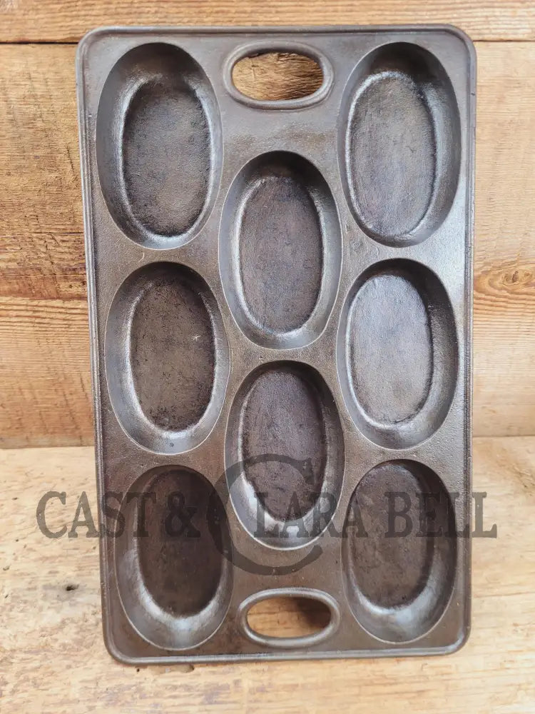 Wow! 1900’s Bridge Beach & Company #2 oval style gem pan. Priced to sell for small crack perfect for baking still after