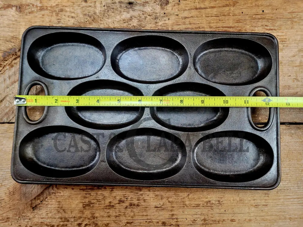 Wow! 1900’s Bridge Beach & Company #2 oval style gem pan. Priced to sell for small crack perfect for baking still after
