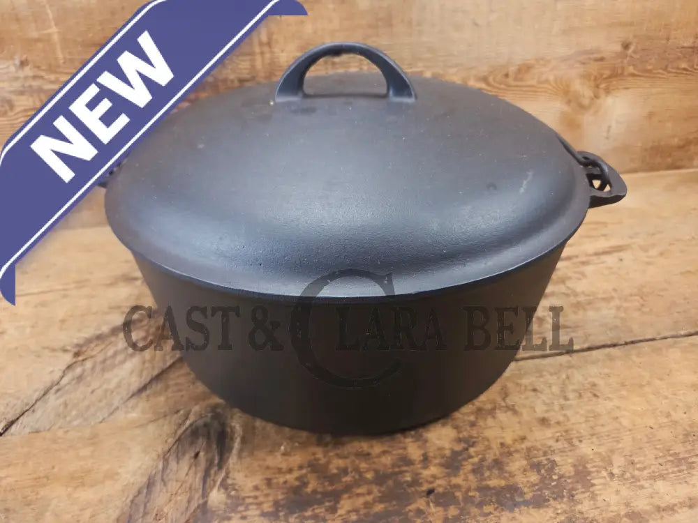 WOW. Not seen often! Griswold first series Slant Logo w/ ERIE Dutch oven Size #10 (835) Dutch Oven with ERIE Logo &