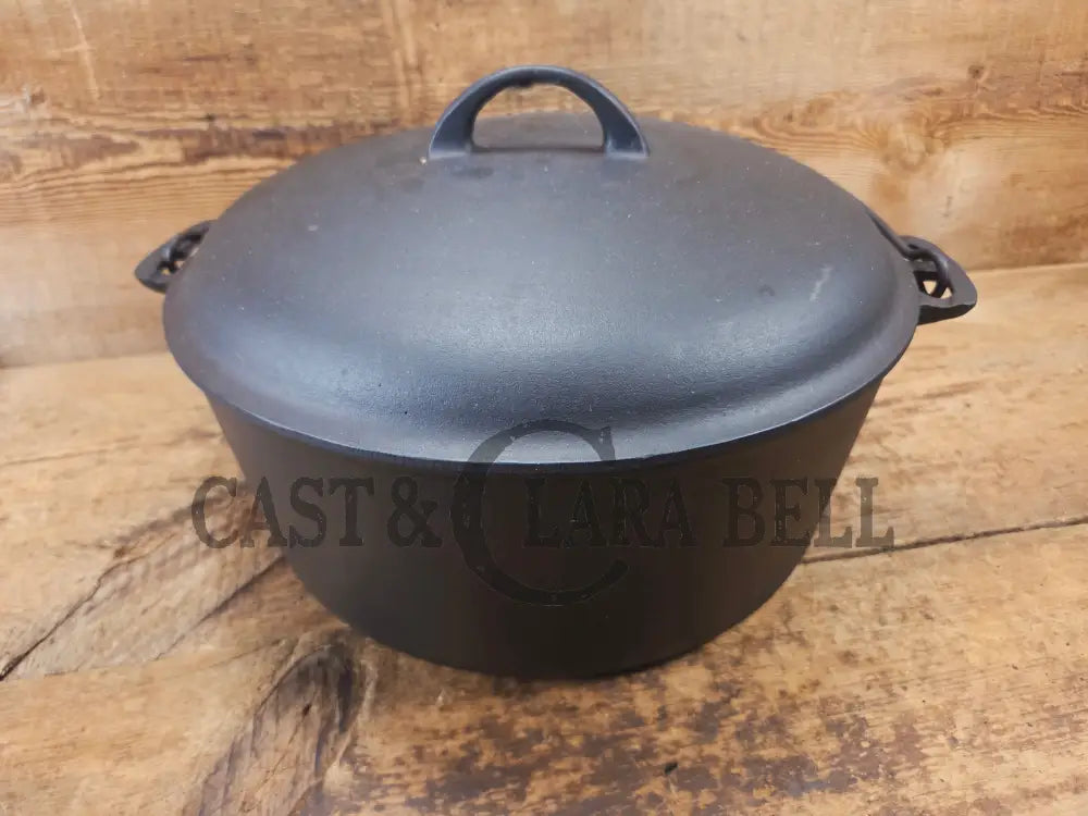 WOW. Not seen often! Griswold first series Slant Logo w/ ERIE Dutch oven Size #10 (835) Dutch Oven with ERIE Logo &